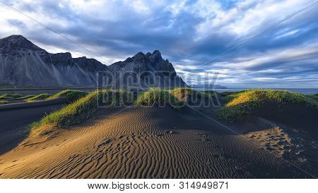 Fantastic Sunny Day And Gorgeous Black Sand Dunes On Stokksnes Cape In Iceland. Location: Stokksnes 