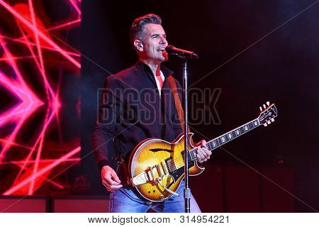 WANTAGH, NY - JUL 26: Nick Hexum of 311 performs in concert on July 26, 2019 at Northwell Health at Jones Beach Theater in Wantagh, New York. 