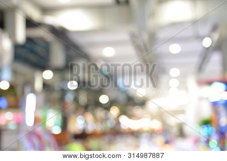 Atmosphere Of Exhibition Hall With Boken Lights Blur Background,use For Backdrop Or Web Design,inter