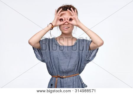 Girl Holding Fingers Near Eyes Like Glasses:. Mask Like Super Hero Or Owl.