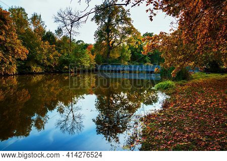 Landscape By The Water. Bridge Over The River Stara Dyje Near Genoa Castle In The Czech Republic. Tr