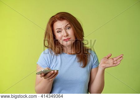 Well Meh. Indifferent Careless Hesitant Redhead Middle-aged Woman Mature Red Female Shrugging Hold S