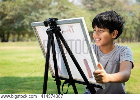 India Elementary School Age Boys Love To Paint In Parks. Boys Are Drawing Pictures As An Outdoor Hob