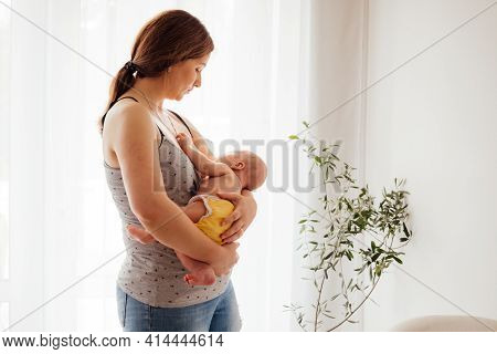 Woman In Postpartum Depression Feeling Unemotional And Exhausted