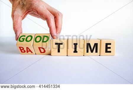 Good Or Bad Time Symbol. Businessman Turns Wooden Cubes And Changes Words 'bad Time' To 'good Time'.