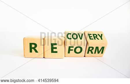 Recovery And Reform Symbol. Turned Cubes And Changed The Word 'recovery' To 'reform'. Beautiful Whit