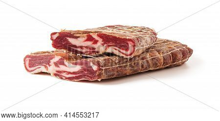 Cut In Half Piece Of Tasty Cured Meat Close-up. Role Trapezitsa Traditional Bulgarian Meat Delicacy 