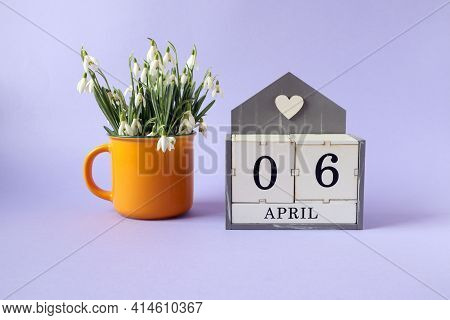 Calendar For April 6: Cubes With The Numbers 0 And 6, The Name Of The Month Of April In English, A B