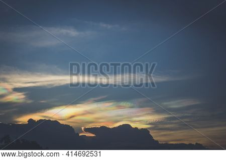 A Rare Look At An Iridescent Cloud. Fire Rainbows Or Rainbow Clouds. Iridescent Pileus Cloud Colorfu
