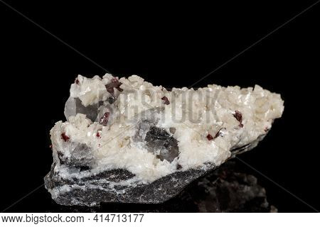 Macro Stone Cinnabar Dolomite Mineral On A Black Background