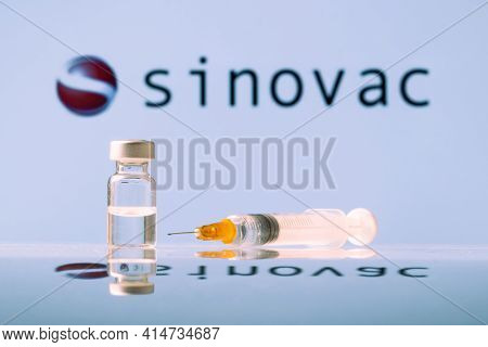 Sinovac Coronavirus Vaccine Vial And Syringe With Logo As Background. Ljubljana, Slovenia: March 25,
