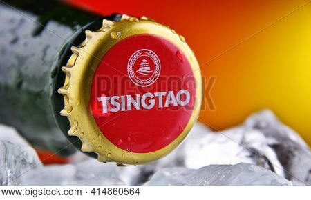 Poznan, Pol - Feb 25, 2021: Crown Cap On A Tsingtao Beer Bottle, Product Of Tsingtao Brewery, China'