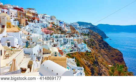 Greece, Santorini Island.  Panoranic view of Oia city on the coast by the sea. Greek landscape