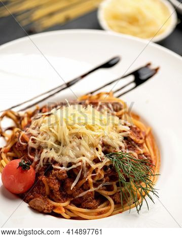 Spaghetti Bolognese With Tomato Sauce, Meat And Grated Parmesan Cheese.vertical Format 4x5 For Adver