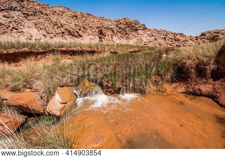 Zaida, Morocco - April 10, 2015. Feeder Of The River Moulouya With Orange Color