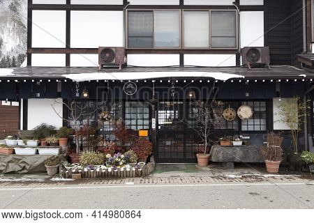 Shirakawa, Japan - Feb 1,2017 : Crowd Of Tourists Enjoy The View Of Japanese Gassho Farmhouse At Shi