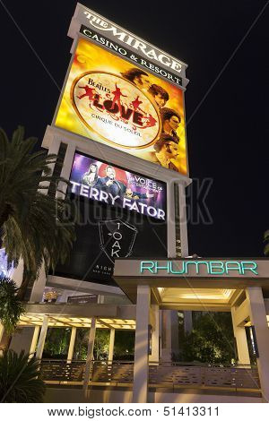 The Mirage Hotel Sign Featuring The Beatles Love Show In Las Vegas, Nv On August 29, 2013