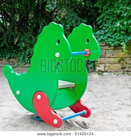 Child's Swing At The Playground