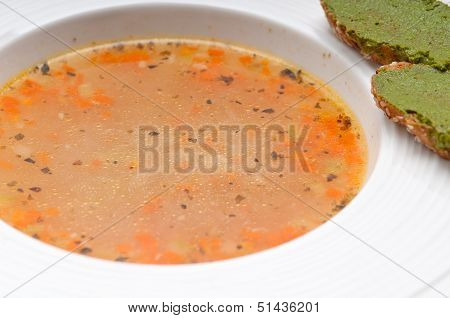 Italian Minestrone Soup With Pesto Crostini On Side