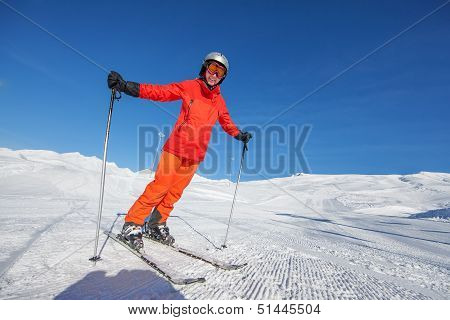 Skier Is Posing At Camera At Gudauri Resort In High Mountaing Of Georgia, Caucasus
