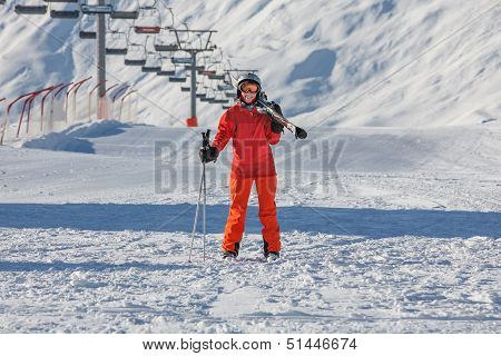 Skier Is Posing At Camera At Gudauri Resort In High Mountaing Of Georgia, Caucasus