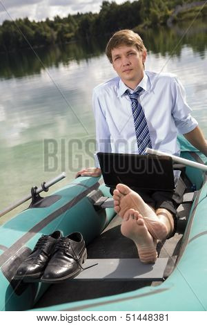 Dressed Man In Boat Rest