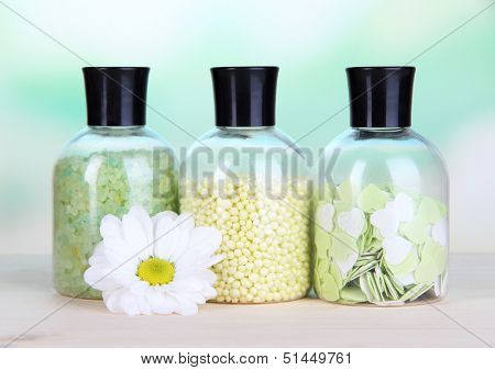 Aromatherapy minerals - colorful bath salt on light background
