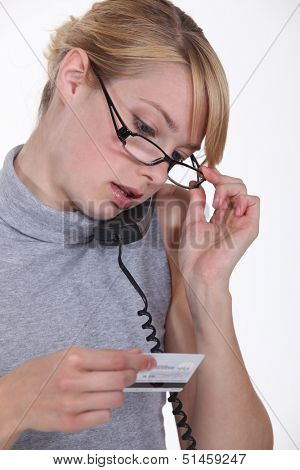 Woman calling her credit card company