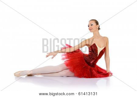 Professional bellet dancer posing at studio. Isolated over white background. 