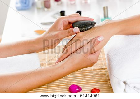 Close up of process of hand massage at beauty salon