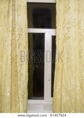 Window With Yellow Curtains