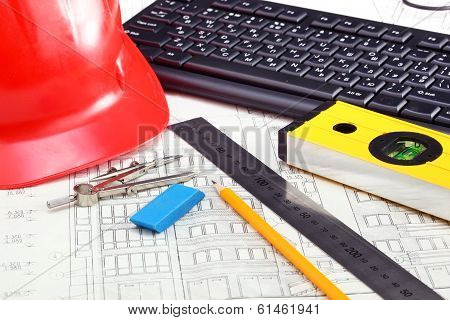 construction drafts and tools on the table