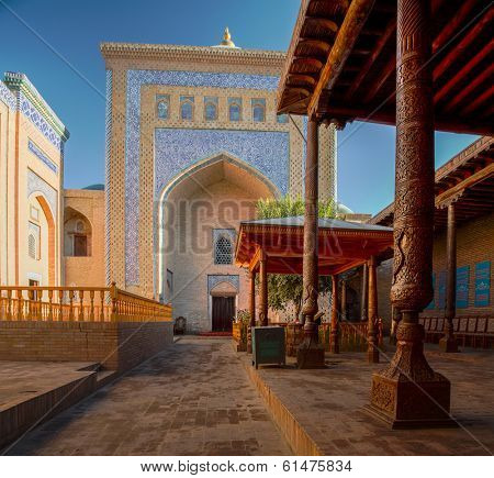 Yard of an ancient mosque in the city of Itchan Kala at sunny day, Khiva, Uzbekistan