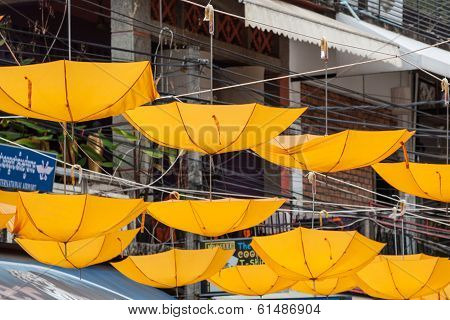 Street Decorated With Yellow Umbrellas