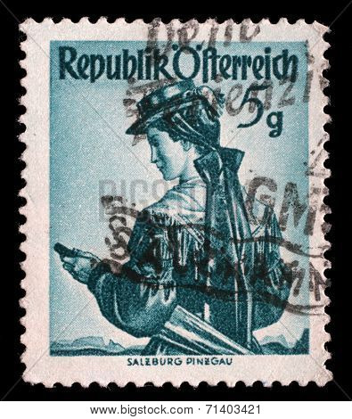 AUSTRIA - CIRCA 1949: a stamp printed in the Austria shows Woman from Salzburg, Pinzgau, Regional Costume, circa 1949