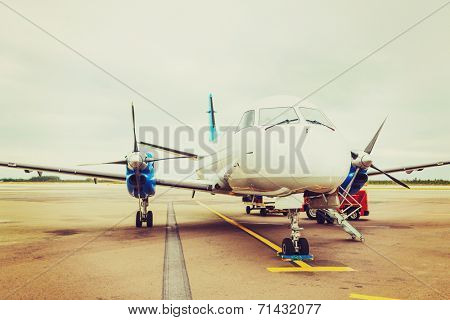 plane, airport, tourism and transportation concept - plane on runway at airport