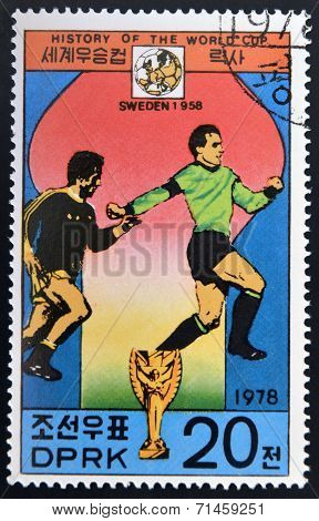 NORTH KOREA - CIRCA 1978: a stamp printed in North Korea shows football players World football cup