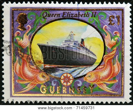GUERNSEY - CIRCA 1999: A stamp printed in Guernsey shows Queen Elizabeth 2 (Liner) circa 1999