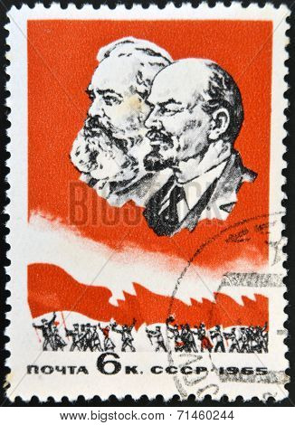 USSR - CIRCA 1965: A stamp printed in USSR shows portrait of Karl Marx and Vladimir Lenin circa 1965