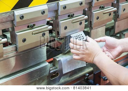 Worker At Manufacture Workshop Operating Cidan Folding Machine