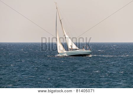 Sailing Vessel In Deep Blue Ocean