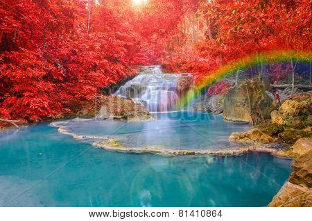 Wonderful Waterfall With Rainbows And Red Leaf In Deep Forest At Erawan Waterfall National Park, Kan
