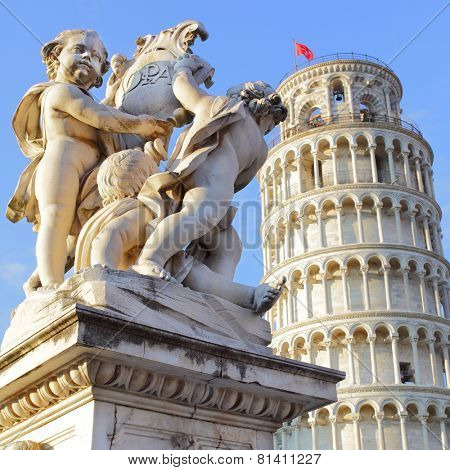 The Leaning Tower of Pisa and La Fontana dei Putti Statue, Italy.