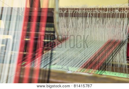 Weaving Loom And Shuttle On The Warp.