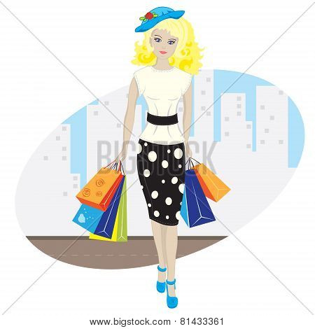Girl with shopping on the background of the city