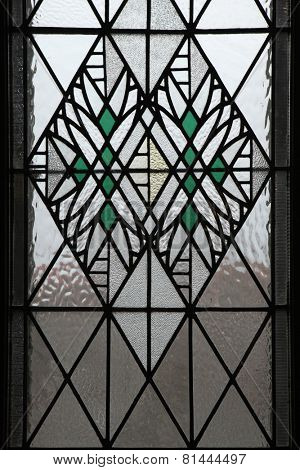 HRADEC KRALOVE, CZECH REPUBLIC - MARCH 31, 2013: Art Nouveau stained glass window in Hradec Kralove, Czech Republic. 