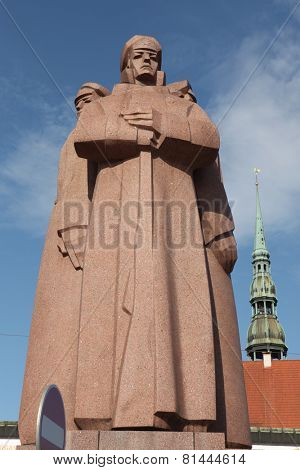 RIGA, LATVIA - AUGUST 4, 2013: Soviet era monument for the Latvian Riflemen in Riga, Latvia.