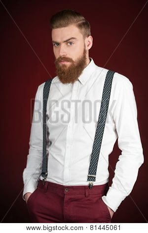 Man with beard looking at camera