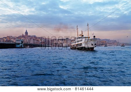 Passenger ship in Bosporus near Galata bridge