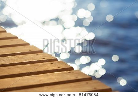 Blue sea and wooden pier